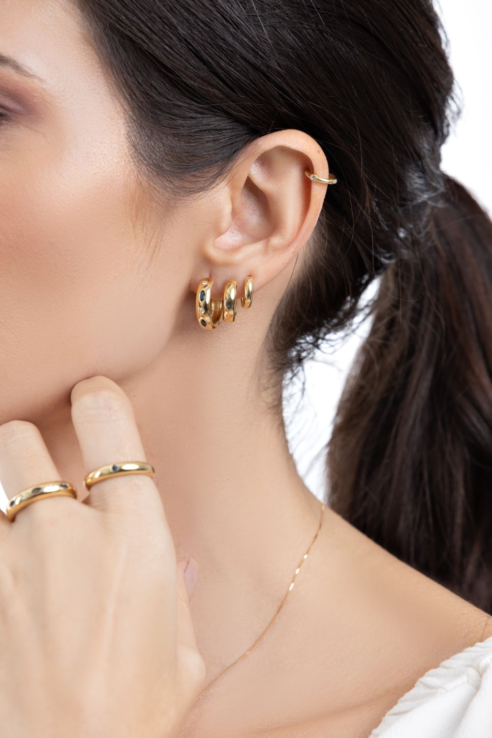 Anel tipo aliança ouro 18k, topázio london blue navete e brilhantes