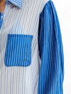 Camisa mangas longas listras azuis 