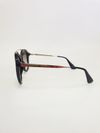 Óculos Prada