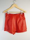 Shorts saia Cris Barros couro