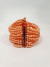 Pulseira em coral e ouro