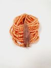Pulseira em coral e ouro