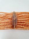Pulseira em coral e ouro