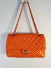 Bolsa Chanel Double Flap média