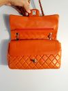Bolsa Chanel Double Flap média