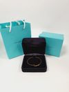 Pulseira Tiffany & Co. T1 estreita em ouro