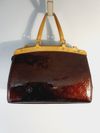 Bolsa Louis Vuitton Brea MM