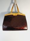 Bolsa Louis Vuitton Brea MM