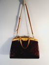 Bolsa Louis Vuitton Brea MM