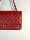 Bolsa Chanel Double Flap Caviar média