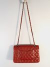 Bolsa Chanel Double Flap Caviar média