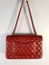 Bolsa Chanel Double Flap Caviar média
