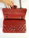 Bolsa Chanel Double Flap Caviar média