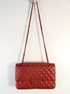 Bolsa Chanel Double Flap Caviar média