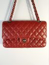 Bolsa Chanel Double Flap Caviar média