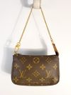 Bolsa Louis Vuitton Pochette Monograma Mini
