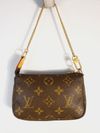 Bolsa Louis Vuitton Pochette Monograma Mini