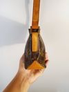 Bolsa Louis Vuitton Trotteur Monogramado