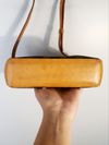 Bolsa Louis Vuitton Trotteur Monogramado