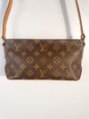 Bolsa Louis Vuitton Trotteur Monogramado