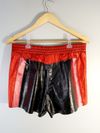 Shorts NK couro