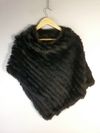 Poncho em pele