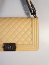 Bolsa Chanel Boy média