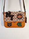 Bolsa Coach Rogue Top Handle in Signature
