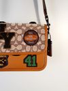 Bolsa Coach Rogue Top Handle in Signature