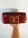 Clutch Louis Vuitton Sobe