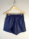 Shorts couro