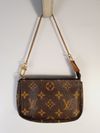 Bolsa Louis Vuitton Pochette