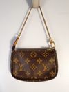 Bolsa Louis Vuitton Pochette