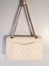 Bolsa Chanel Double Flap Caviar Média