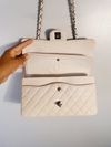 Bolsa Chanel Double Flap Caviar Média