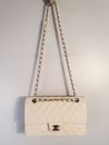 Bolsa Chanel Double Flap Caviar Média