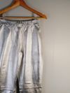 Calça de couro metalizada