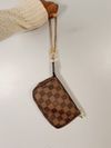 Bolsa Louis Vuitton Pochette Damier Ebene