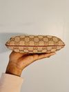 Bolsa Gucci Jolicoeur Wrislet Monogram
