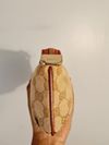 Bolsa Gucci Jolicoeur Wrislet Monogram