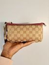 Bolsa Gucci Jolicoeur Wrislet Monogram