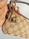 Bolsa Gucci Jolicoeur Wrislet Monogram