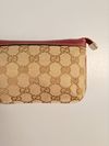 Bolsa Gucci Jolicoeur Wrislet Monogram