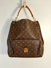 Bolsa Louis Vuitton Metis Hobo Monogram