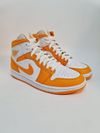 Tênis Nike Air Jordan 1 University Gold