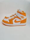 Tênis Nike Air Jordan 1 University Gold