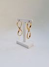 Brinco Valiatti Infinito ouro amarelo 18K