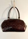 Bolsa Louis Vuitton Sherwood Verniz Amarante