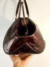 Bolsa Louis Vuitton Sherwood Verniz Amarante