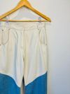 Calça Juliana Sanmartin couro e jeans